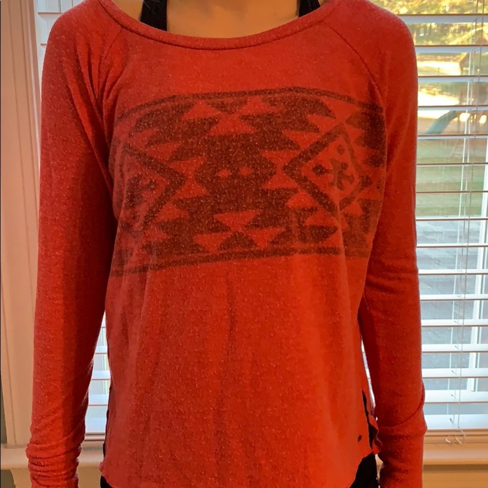 A long sleeve light sweater